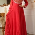 Stunning red color designer gown for wedding look